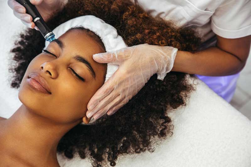 Woman getting skin treatment.