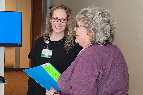 Daysha Lilly, RN, left and Peg Martin.