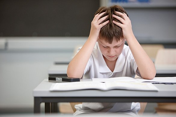 boy struggling during exam