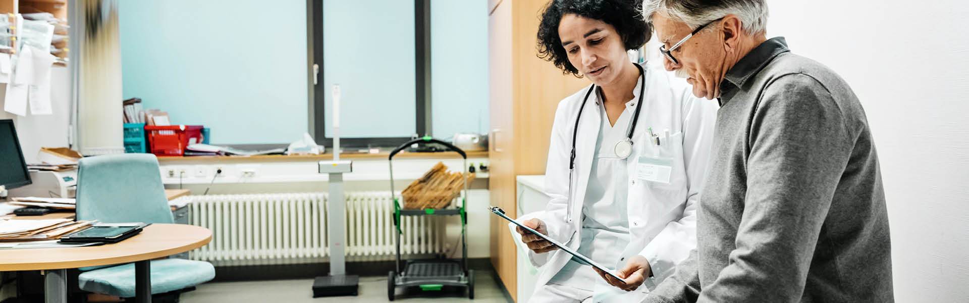 Doctor talking to a patient.