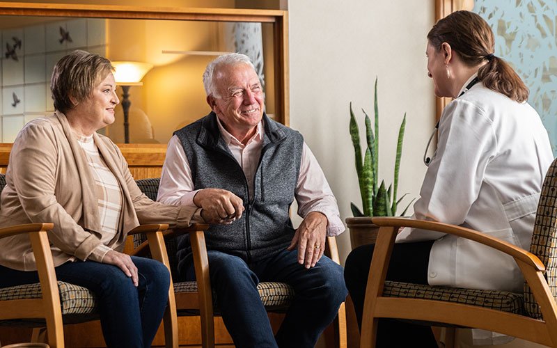 Avera doctor talking to husband and wife.