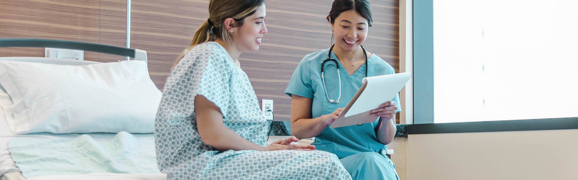 health care provider going over information with a patient.