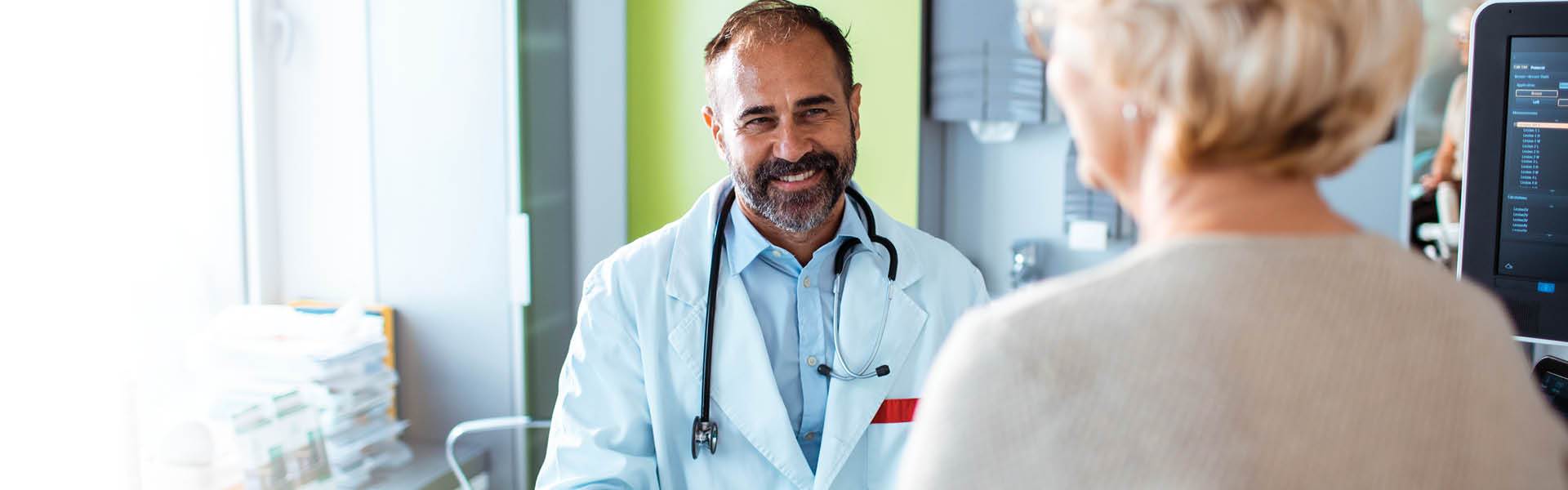 doctor talking to patient